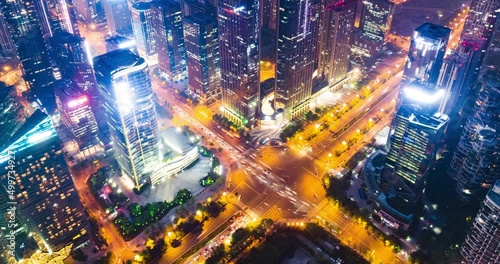 Aerial hyperlapse of Chengdu Cityscape at twilight  with buildings and traffic on the road