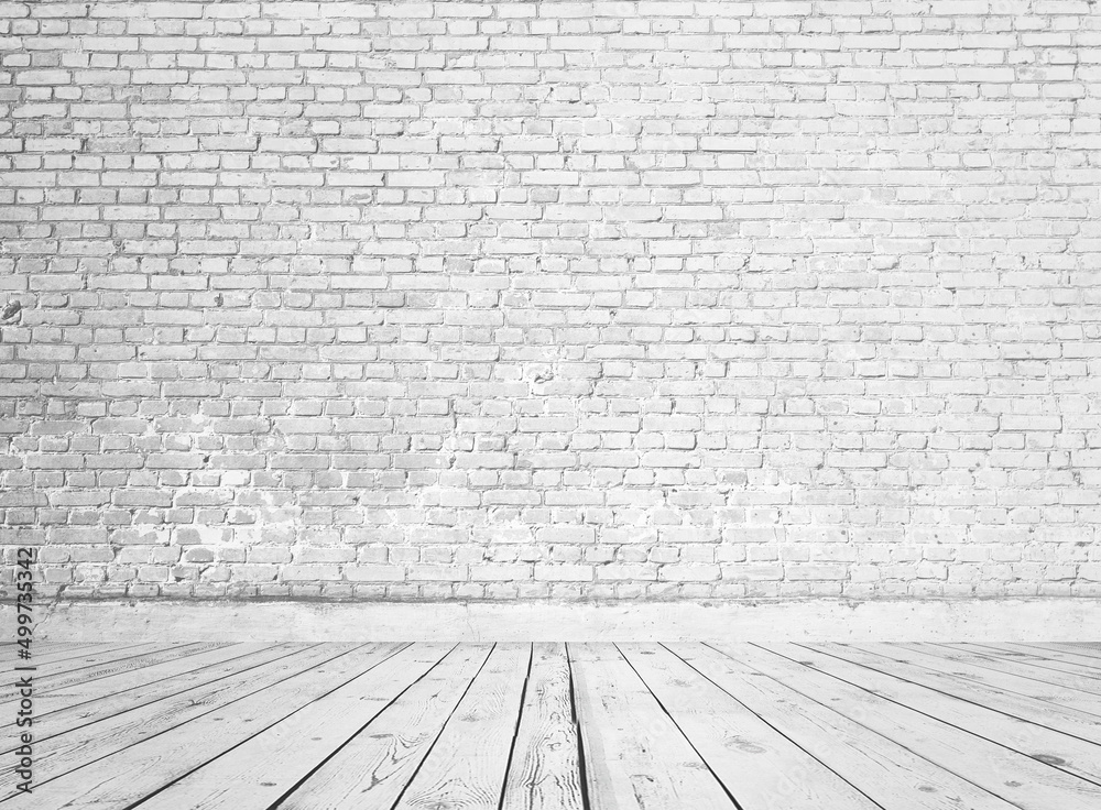 Fototapeta premium gray interior with brick wall