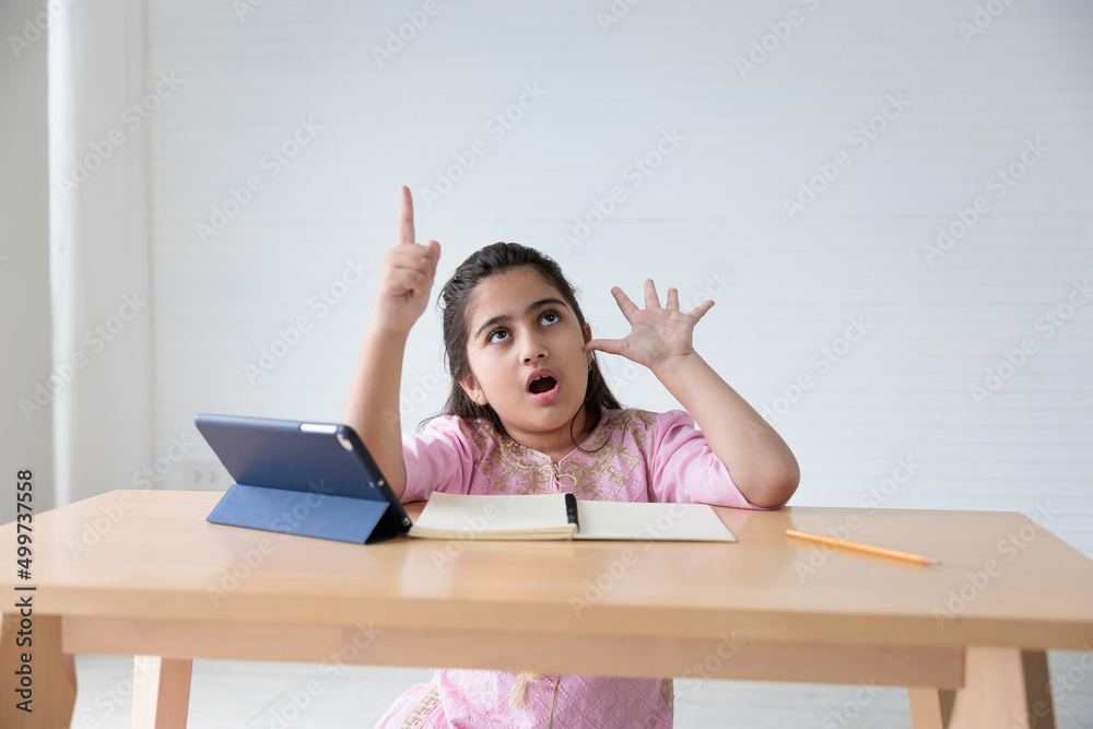 cute Indian girl finger counting gesture and online learning class, education concept cute Indian girl finger counting gesture and online learning class, education concept
