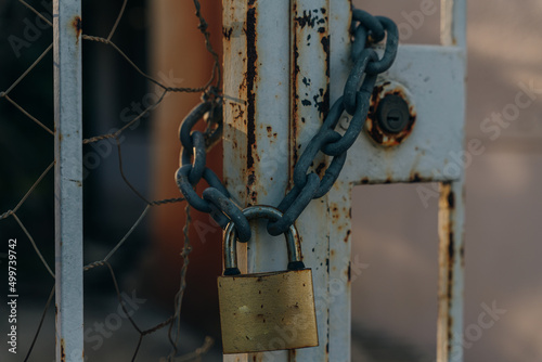 old locker on a metal fence photo