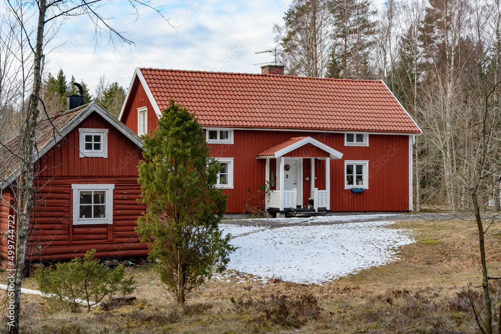 wooden house near lake vaettern in sweden