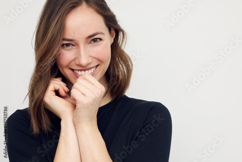 Fotografie Portrait of beautiful young female or woman looking happy and confident in camera