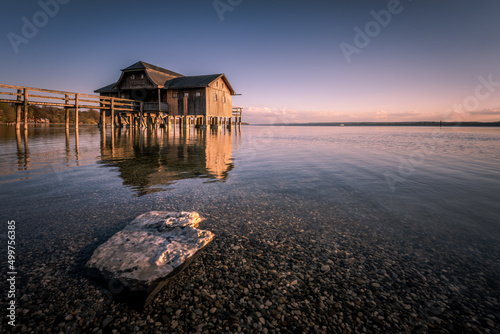 Foto Traditional boathouse at lake Ammersee near Munich, Bavaria, Germany at sunrise