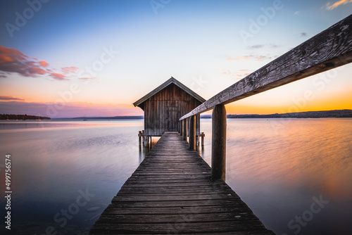 Tablou canvas Traditional boathouse at lake Ammersee near Munich, Bavaria, Germany at sunrise