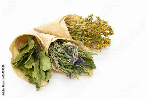Dried herbs isolated on white background. Medicinal plants for tea. Alternative medicine.