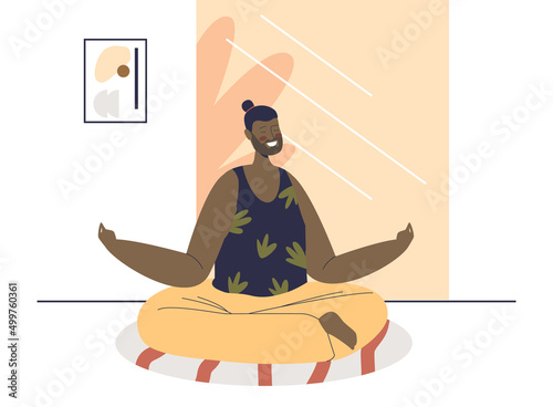 Man sit in lotus yoga pose with closed eyes meditating at home. Guy practice meditation