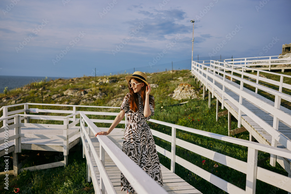 portrait of a woman in dress walk luxury tourism summer nature