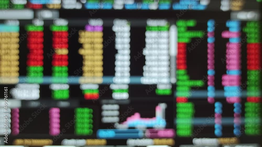 Blur background of monitor display of stock exchange real-time trading, Multi-color blinking, Trading stock real-time buy and sell on blur computer screen. Blur background of monitor display of stock exchange real-time trading, Multi-color blinking, Trading stock real-time buy and sell on blur computer screen.