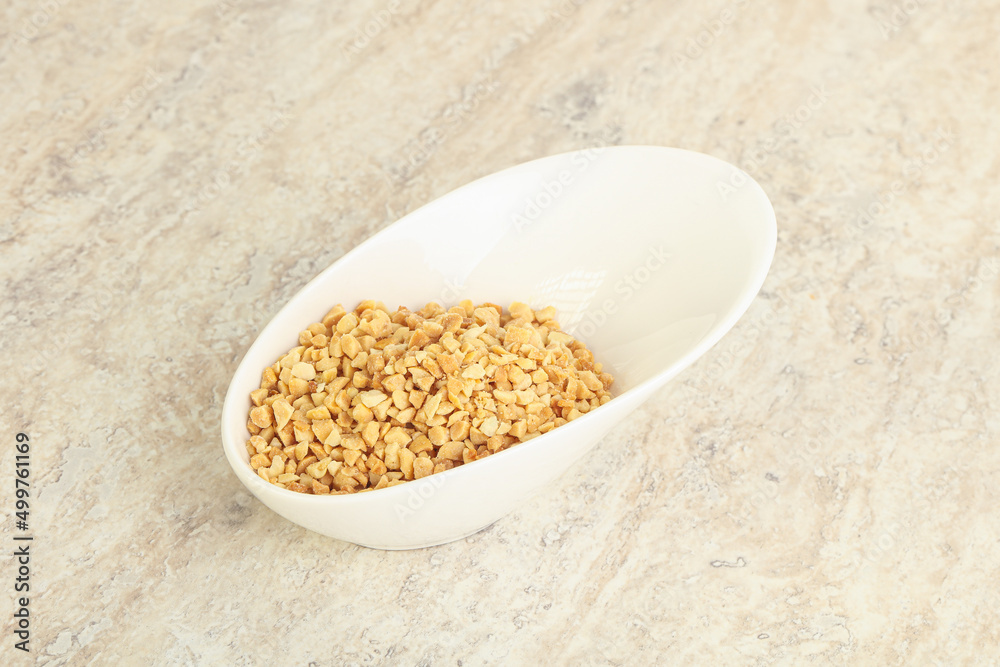Crunched roasted peanut in the bowl Crunched roasted peanut in the bowl