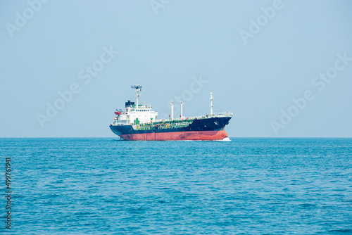 Angle side view of oil tanker container ship at sea. Crude oil tanker lpg ngv at industrial estate Thailand - Oil tanker ship to Port of Singapore - import export 