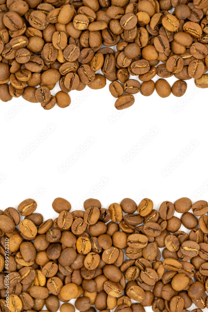Coffee beans isolated on a white background. The middle is left blank as a text area. Close-up. Copy space. Empty space for text. Top view Coffee beans isolated on a white background. The middle is left blank as a text area. Close-up. Copy space. Empty space for text. Top view