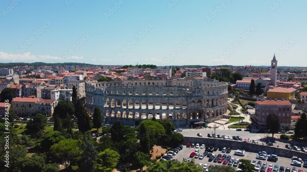 Aerial view of the ancient Roman amphitheater in Pula Croatia with the old town in the background Aerial view of the ancient Roman amphitheater in Pula Croatia with the old town in the background