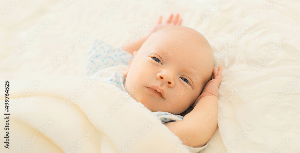 Close up portrait of infant sweet sleeping on white bed at home Close up portrait of infant sweet sleeping on white bed at home
