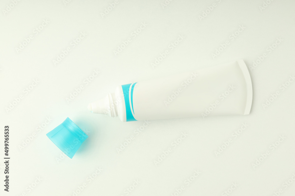 Fototapeta premium Blank toothpaste tube on white background, space for text