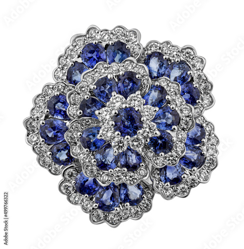 Obraz na płótnie Diamond ring. Diamond ring isolated on white background. Ring with diamonds and sapphires. White gold. Golden flower with diamonds. w salonie