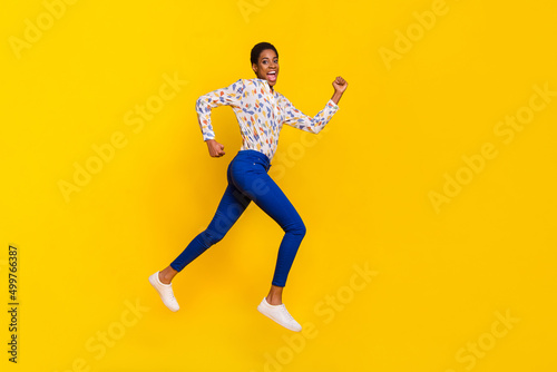 Full size profile photo of energetic sportive person rush speed good mood isolated on yellow color background