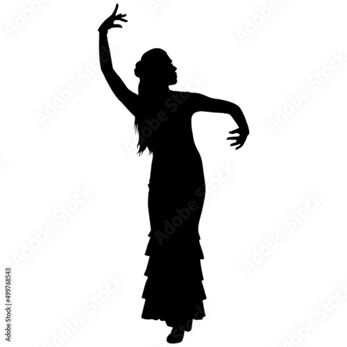 Silhouette of slender flamenco dancer in beautiful dress