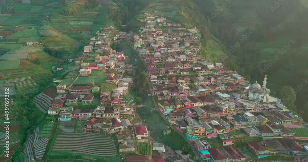 aerial drone of the village of Butuh, nicknamed Nepal van Java, is located on the slopes of Mount Sumbing, Central Java, Indonesia. housing in the hills. tourist attractions in Magelang. aerial drone of the village of Butuh, nicknamed Nepal van Java, is located on the slopes of Mount Sumbing, Central Java, Indonesia. housing in the hills. tourist attractions in Magelang.