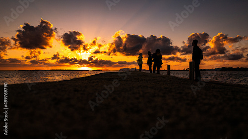 silhouette of a couple on the beach  sunset  Sicilia