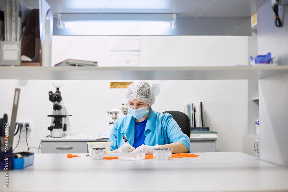 Women work in the lab. Conducts experiments on vaccines. Women work in the lab. Conducts experiments on vaccines.