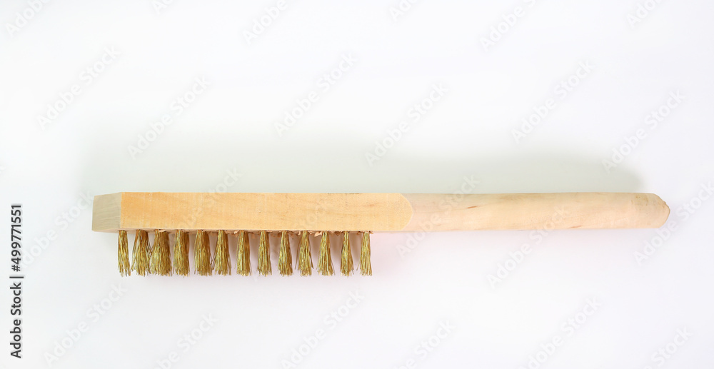 Brass wire scratch brushes for metal cleaning in industrial use isolated on white background. Brass wire scratch brushes for metal cleaning in industrial use isolated on white background.