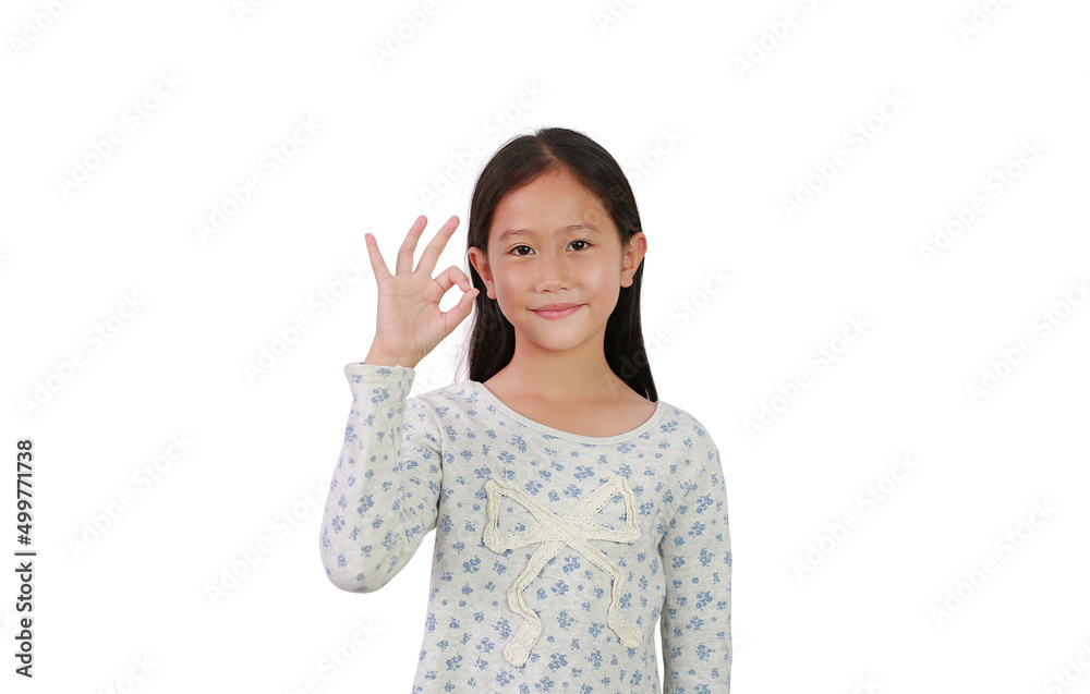 Cheerful young Asian girl kid showing finger ok symbol sign language isolated on white background.