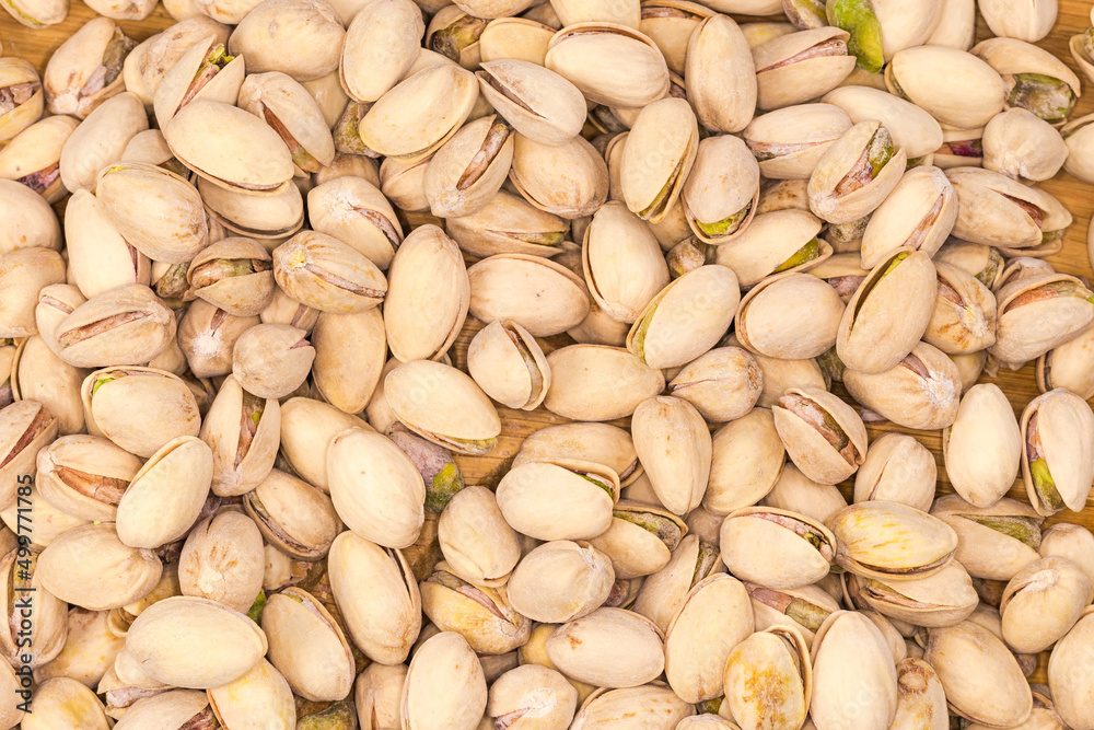 Background of the roasted salted pistachio nuts
