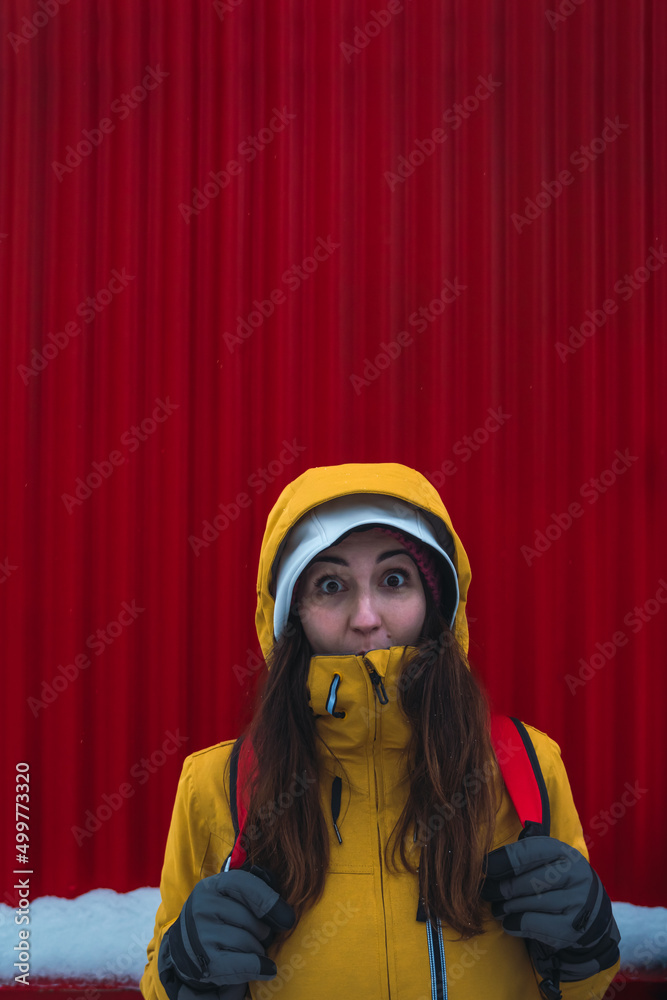 woman facial expression with red background