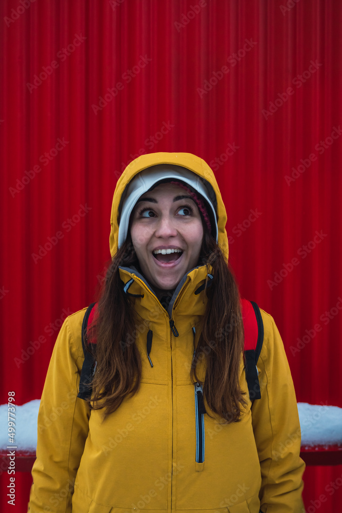 woman facial expression with red background