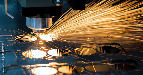 Cnc milling machine. Processing and laser cutting for metal in the industrial. Motion blur. Industrial exhibition of machine tools.