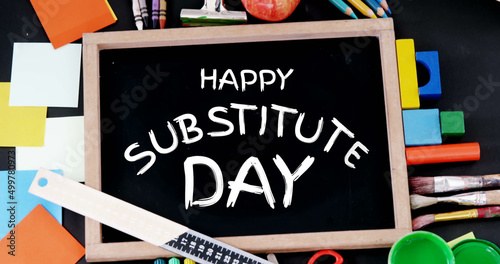 Substitute day text over wooden slate against multiple school equipment icons on black background