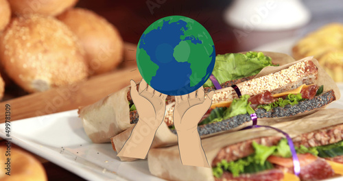 Image of planet earth and hands over fresh organic sandwiches and bread rolls