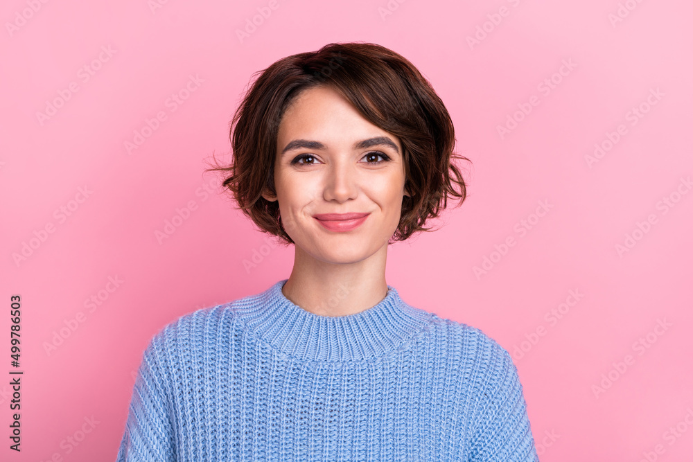 Fototapeta premium Portrait of adorable sweet positive young lady smiling wearing pastel blue comfy sweater isolated on pink color background