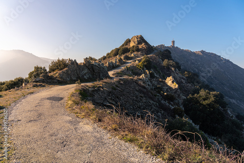 Winding mountain trail leading to the 13th Century Tour de Madeloc in the Cote Vermeille region of southern France photo