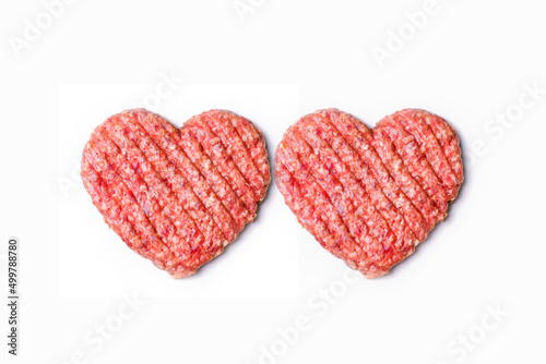 Dinner for lovers on February 14th. Mince heart. Meat cutlet in the shape of a heart. Meat love. Valentine's Day photo
