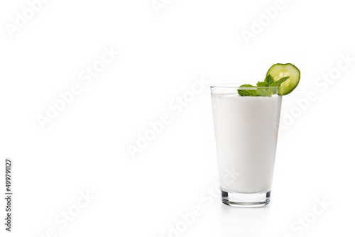 Ayran drink with mint and cucumber in glass isolated on white background. Copy space photo
