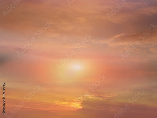  beautiful gold sunset at sea water reflection sun light on pink yellow clouds sky nature background