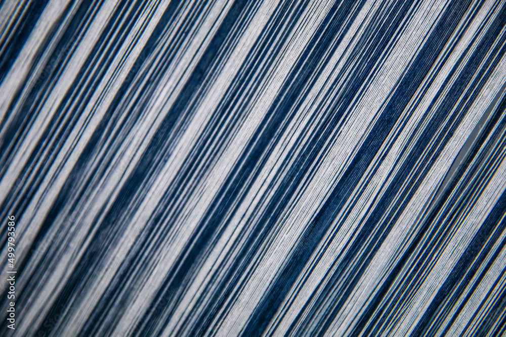 Fototapeta premium Seamless pattern fabric texture on weaving textile machine.