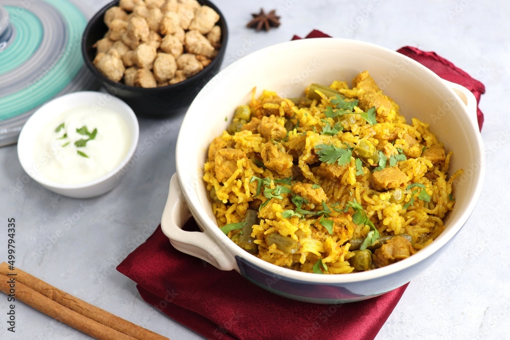 Soya chunks Biryani. Basmati rice cooked with Soyabean or Soya vadi along with spices and vegetables. It's a complete protein rich and nutritious one pot meal. Copy space