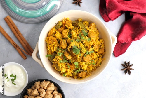 Soya chunks Biryani. Basmati rice cooked with Soyabean or Soya vadi along with spices and vegetables. It's a complete protein rich and nutritious one pot meal. Copy space photo