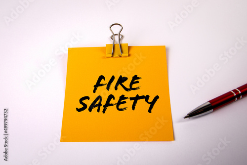 Fire Safety. Sheet of paper and pen on a white background