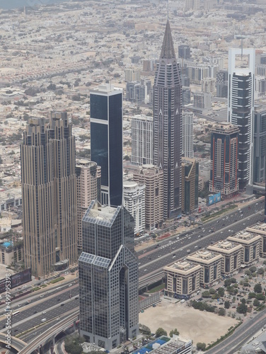 Dubai, UAE- March 31 2022: Multiple large buildings and skyscrapers surrounding central district skyline of the downtown urban city.