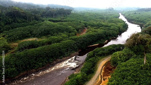 Aerial view. Fog over the tropical forest. River in the jungle. Tropical Africa. photo