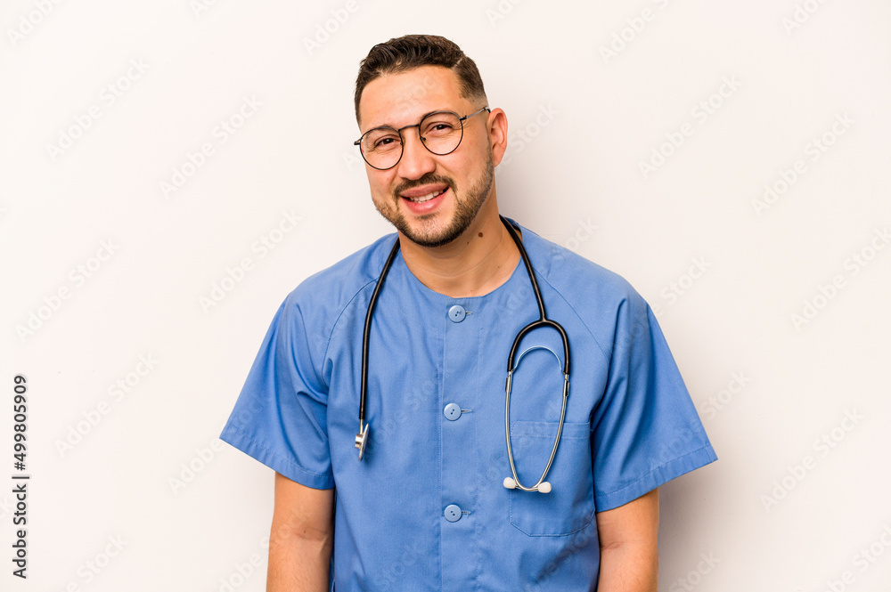Hispanic nurse man isolated on white background happy, smiling and cheerful. Hispanic nurse man isolated on white background happy, smiling and cheerful.