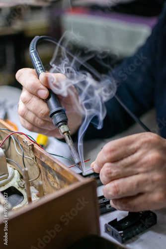 a technician repairing a radio