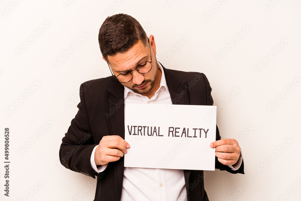 Hispanic business man holding a virtual reality placard isolated on white background Hispanic business man holding a virtual reality placard isolated on white background