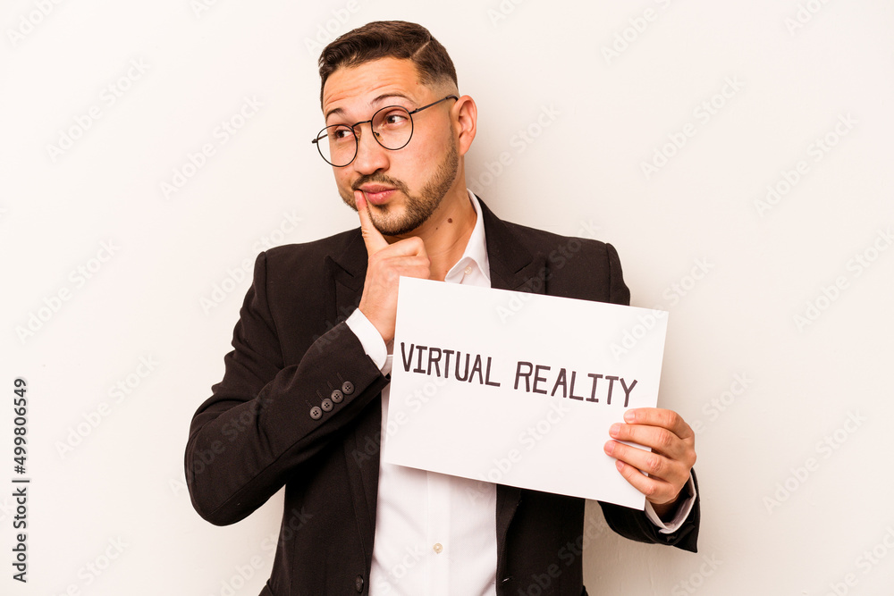 Hispanic business man holding a virtual reality placard isolated on white background Hispanic business man holding a virtual reality placard isolated on white background