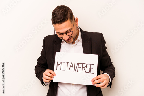 Hispanic business man holding a metaverse placard isolated on white background