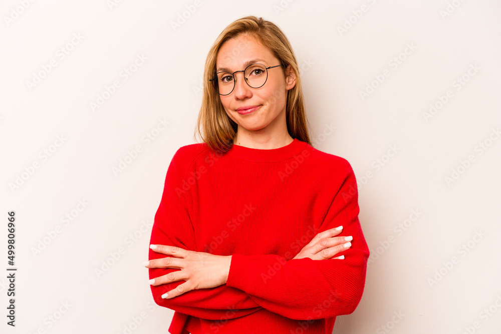 Young caucasian woman isolated on white background suspicious, uncertain, examining you. Young caucasian woman isolated on white background suspicious, uncertain, examining you.