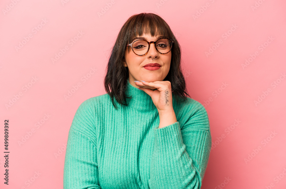 Young caucasian woman isolated on pink background smiling happy and confident, touching chin with hand. Young caucasian woman isolated on pink background smiling happy and confident, touching chin with hand.